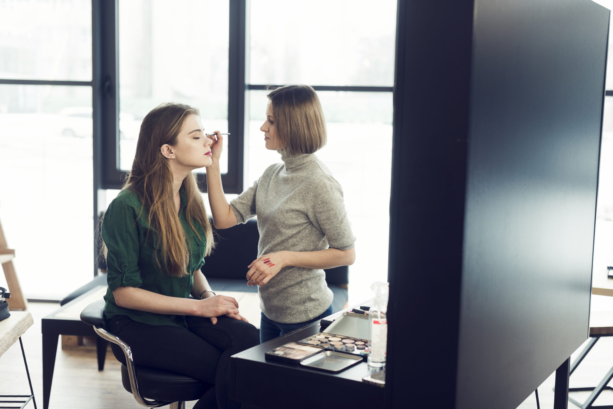 stylist-working-with-model-studio